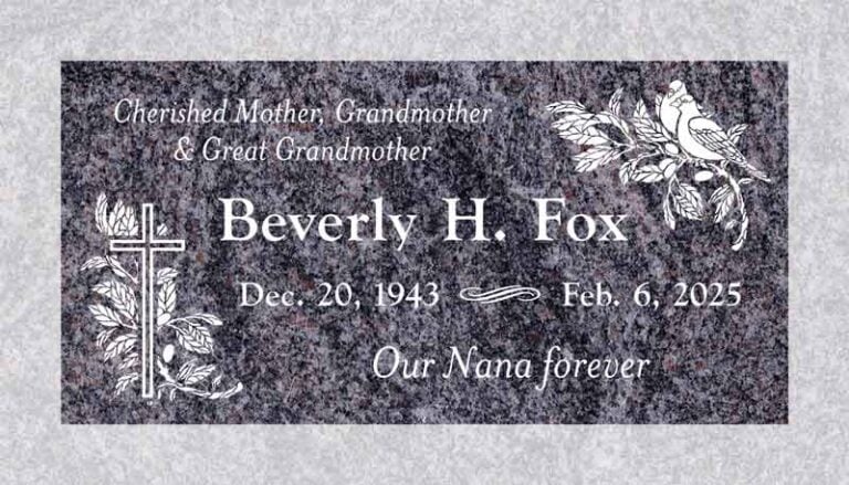 Paradiso granite flat headstone with engraved cross and dove design at Bardsdale Cemetery in Fillmore