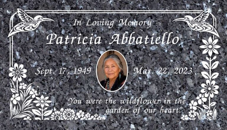 headstone with color portrait placed at rose hills memorial park