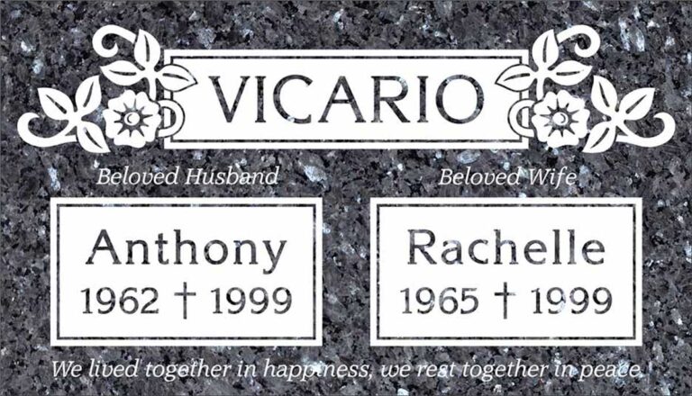 Granite companion grave marker with flowers, scrollwork, and frosted panels