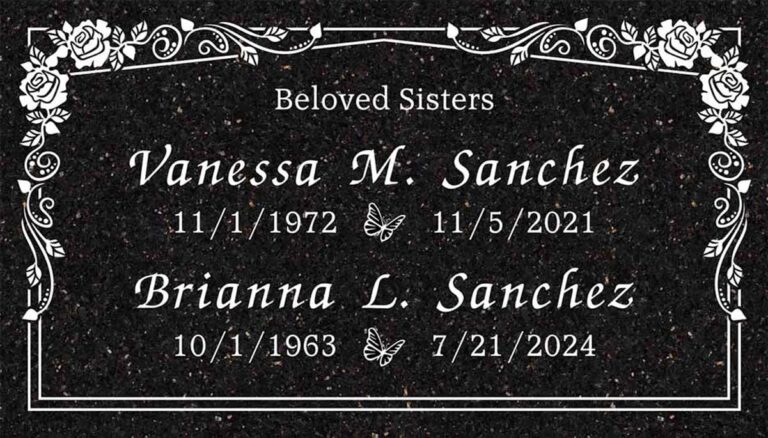 Granite companion grave marker with roses and ornate scrollwork border