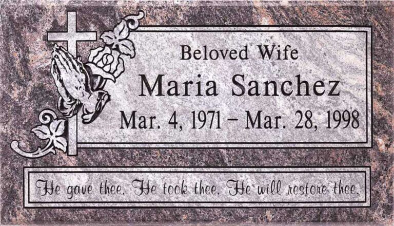 Granite grave marker with cross, rose, praying hands, and scroll