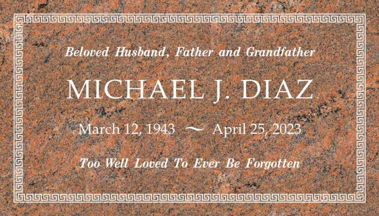Granite grave marker with classic greek key border pattern