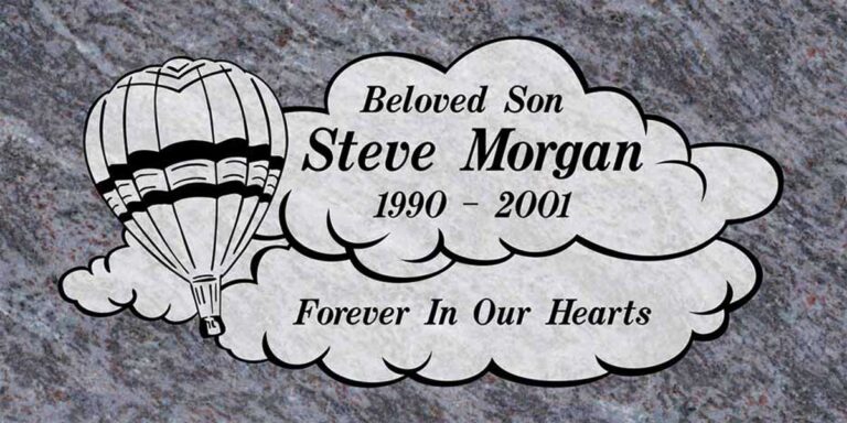 Granite grave marker with hot air balloon and cloud-shaped panel