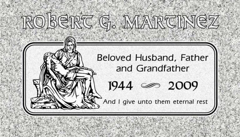 Granite grave marker with Pieta scene and rounded border