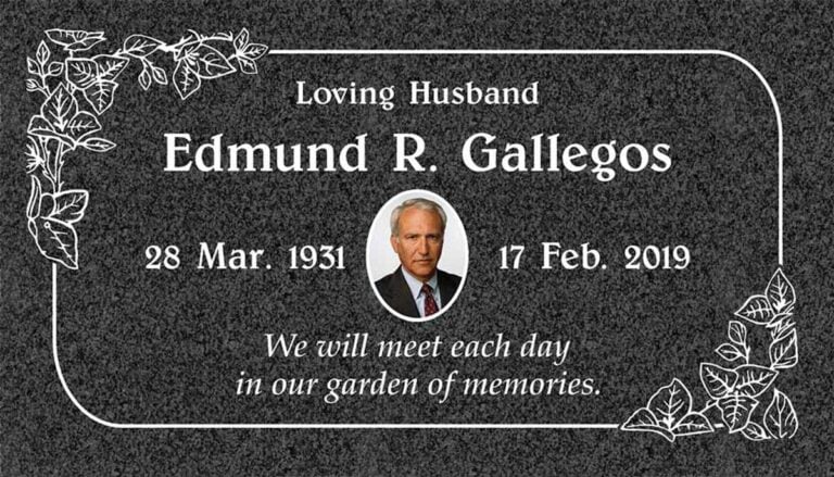 Granite grave marker with portrait cameo and ivy vine corner accents