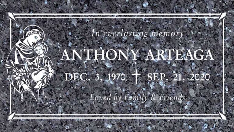 Granite grave marker with Saint Anthony, cross, and art deco border