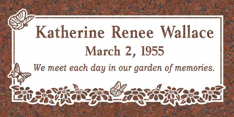 Granite gravestone with butterflies and flower garland border