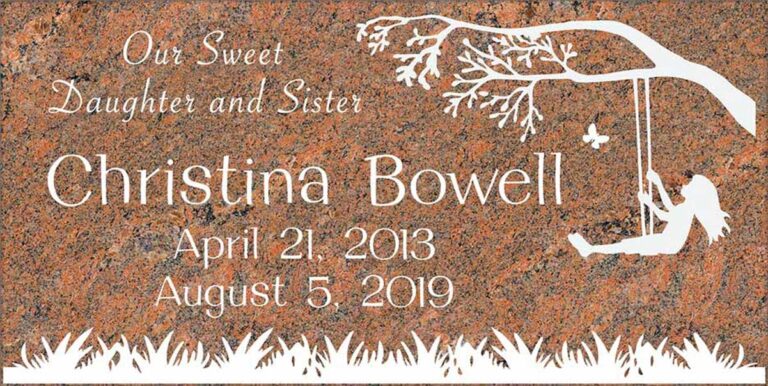 Granite gravestone with child silhouette on tree swing and butterfly
