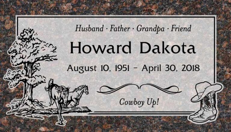 Granite gravestone with horse beneath oak tree, cowboy boots, and hat