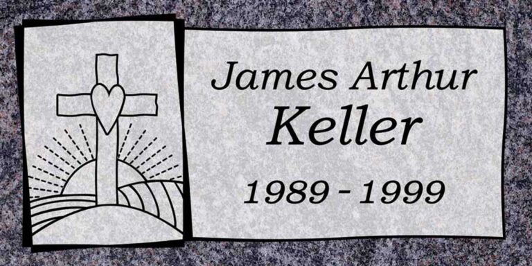 Granite gravestone with cross, heart, sunrise over hills, and inset panel