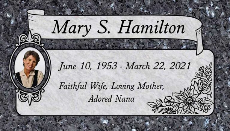 Granite gravestone with portrait oval, scroll banner, roses, and ornate frame