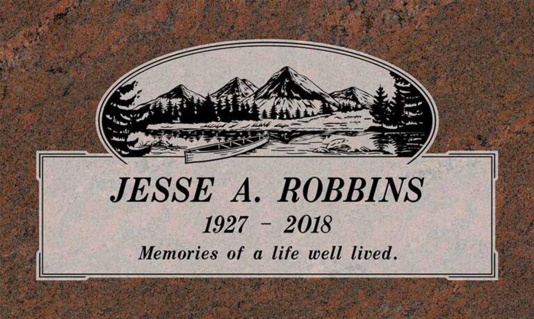Granite headstone with mountain lake, canoe, and pine trees in oval scene
