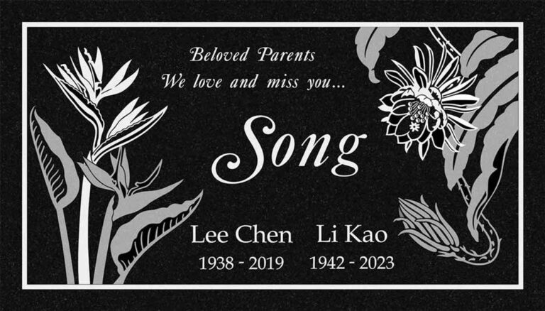 Granite companion memorial with bird of paradise flowers and sunflower