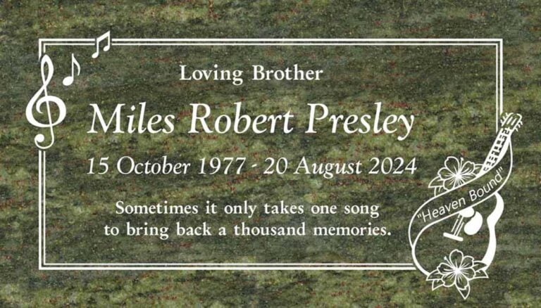 Granite memorial with guitar, music notes, treble clef, and flowers