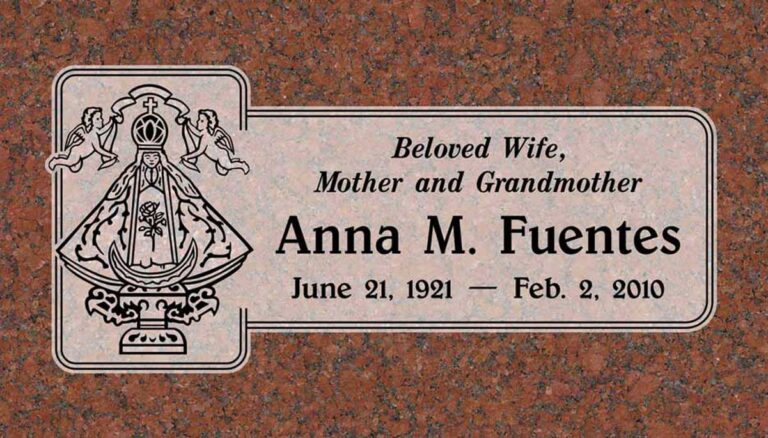 Granite memorial with Our Lady with angels and religious imagery