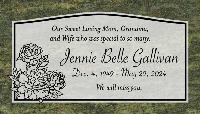 Granite memorial with peony flowers, arched top panel, and double border