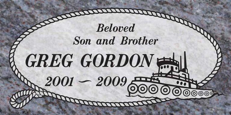 Granite memorial with tugboat and twisted rope border