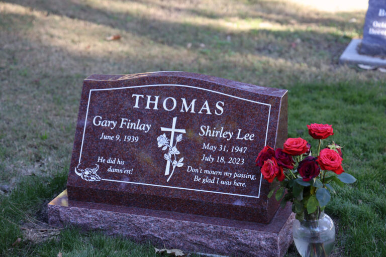 Companion granite slant memorial with cross and rose design at Oak Park Cemetery in Claremont