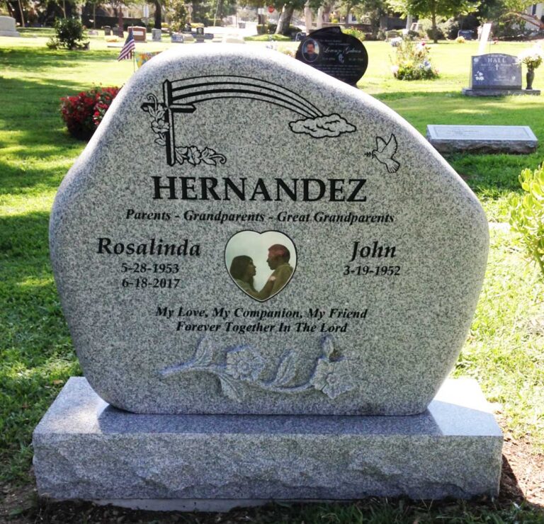 Companion granite monument in boulder shape with dove and cross and heart-shaped portrait at Oak Park Cemetery in Claremont