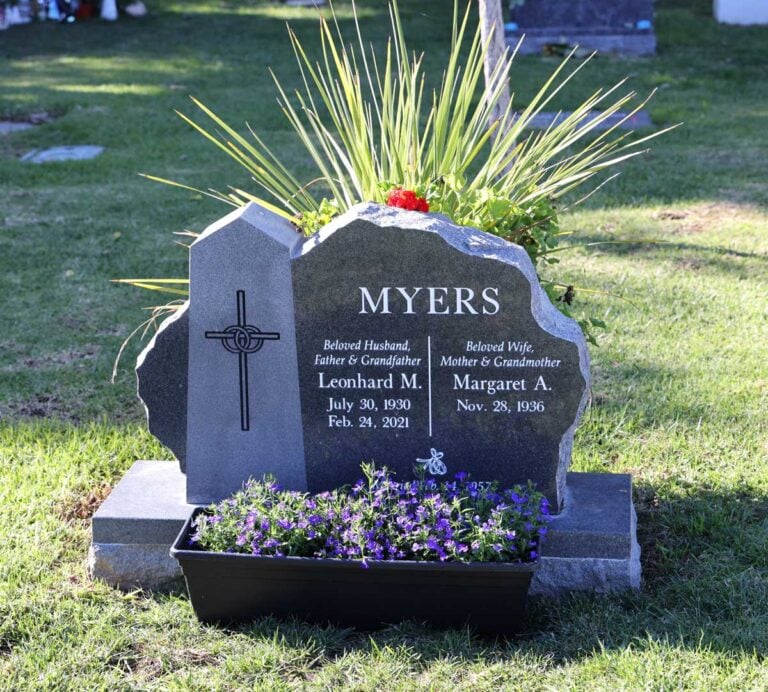 Companion granite monument with cross and natural edge at Oak Park Cemetery in Claremont