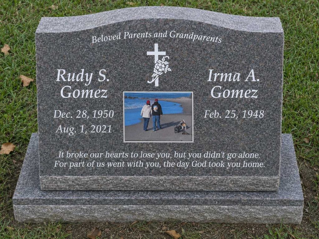 Granite slant memorial with cross and roses and color photo portrait at Oak Park Cemetery in Claremont