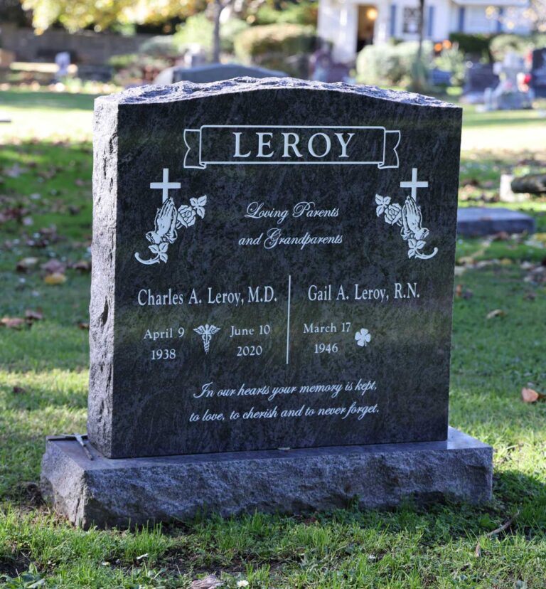 Companion granite monument with crosses and praying hands and rock-pitched edges at Oak Park Cemetery in Claremont