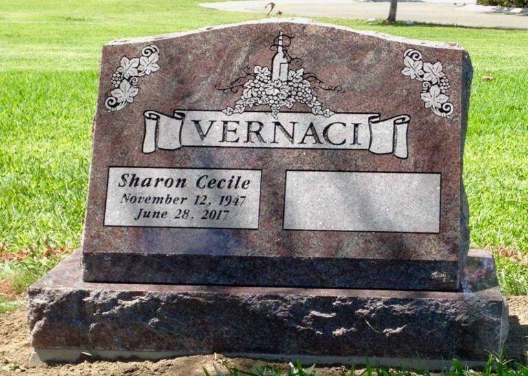 Granite slant memorial with grapevine and banner design at Oak Park Cemetery in Claremont