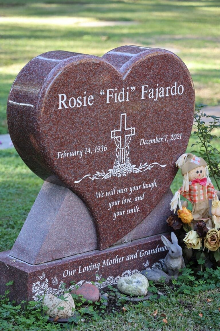 Heart-shaped granite monument with cross design at Oak Park Cemetery in Claremont