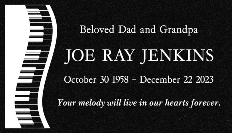 Black granite headstone with piano keys design at Rose Hills Memorial Park