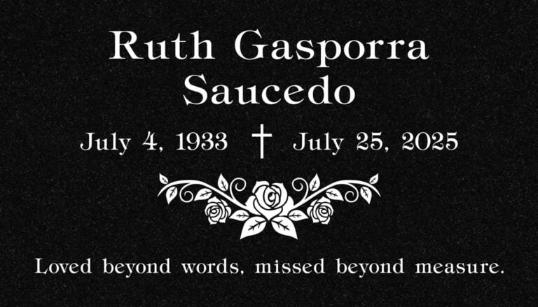 Black granite headstone with rose scrollwork design at Rose Hills Memorial Park