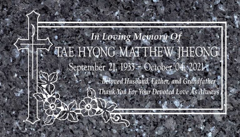 Blue Pearl granite memorial with cross and floral corner design at Holy Sepulcher Cemetery in Orange