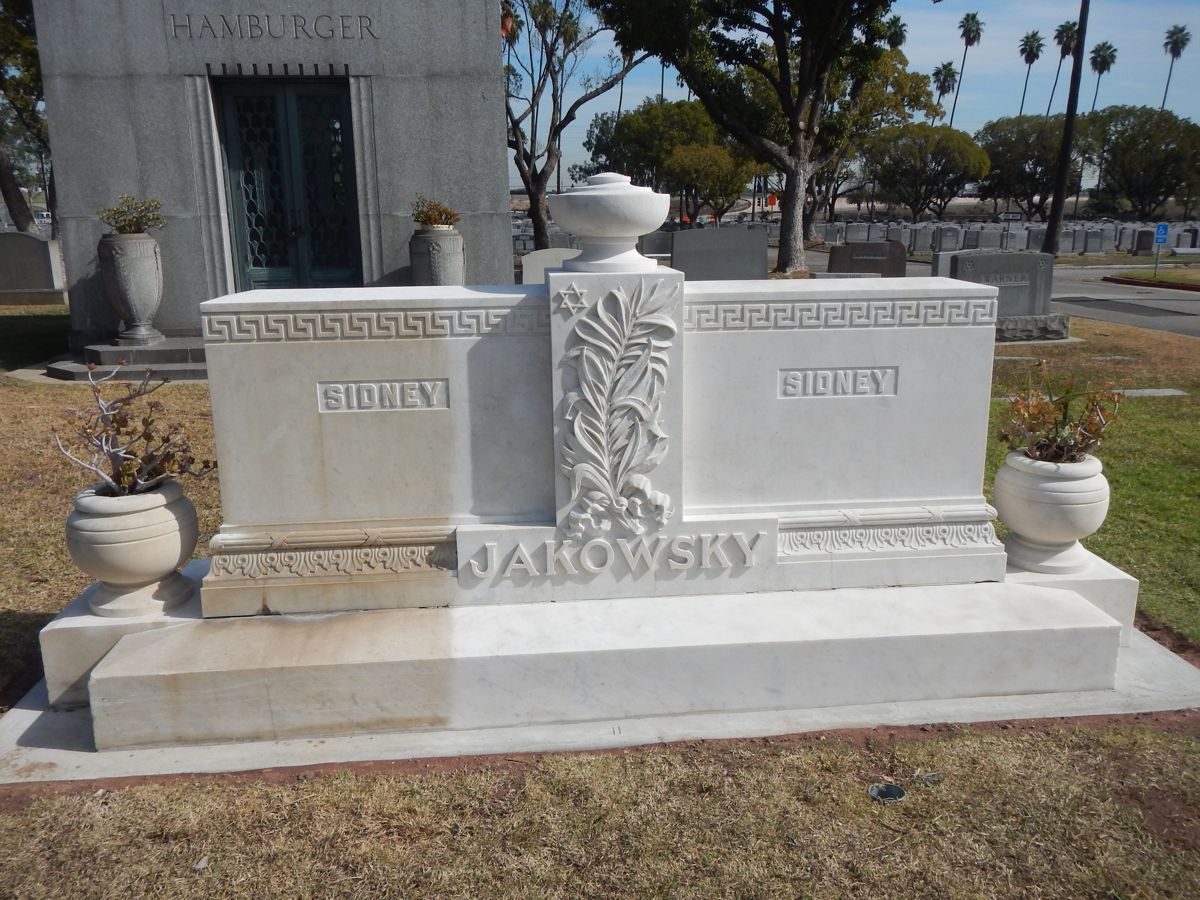 Marble double headstone, one half professionally cleaned and one half still weathered