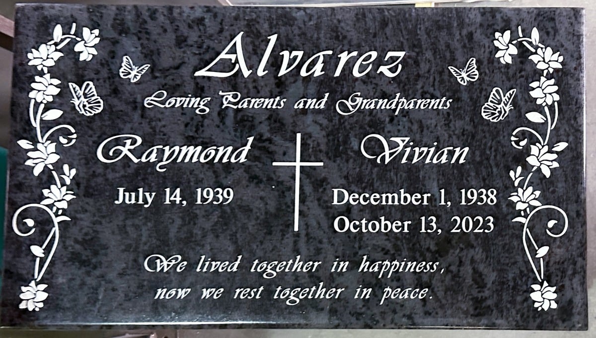 Bahama Blue granite companion memorial stone with butterflies and cross, Alvarez family, Bellevue Memorial Park