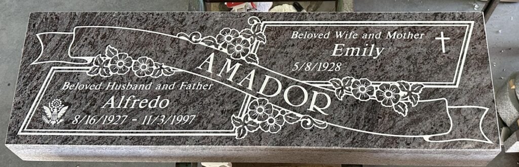 Bahama Blue granite companion memorial with flowers and ribbon, Amador family, Rose Hills Memorial Park