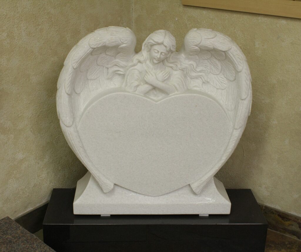 White Marble upright monument with angel wings heart