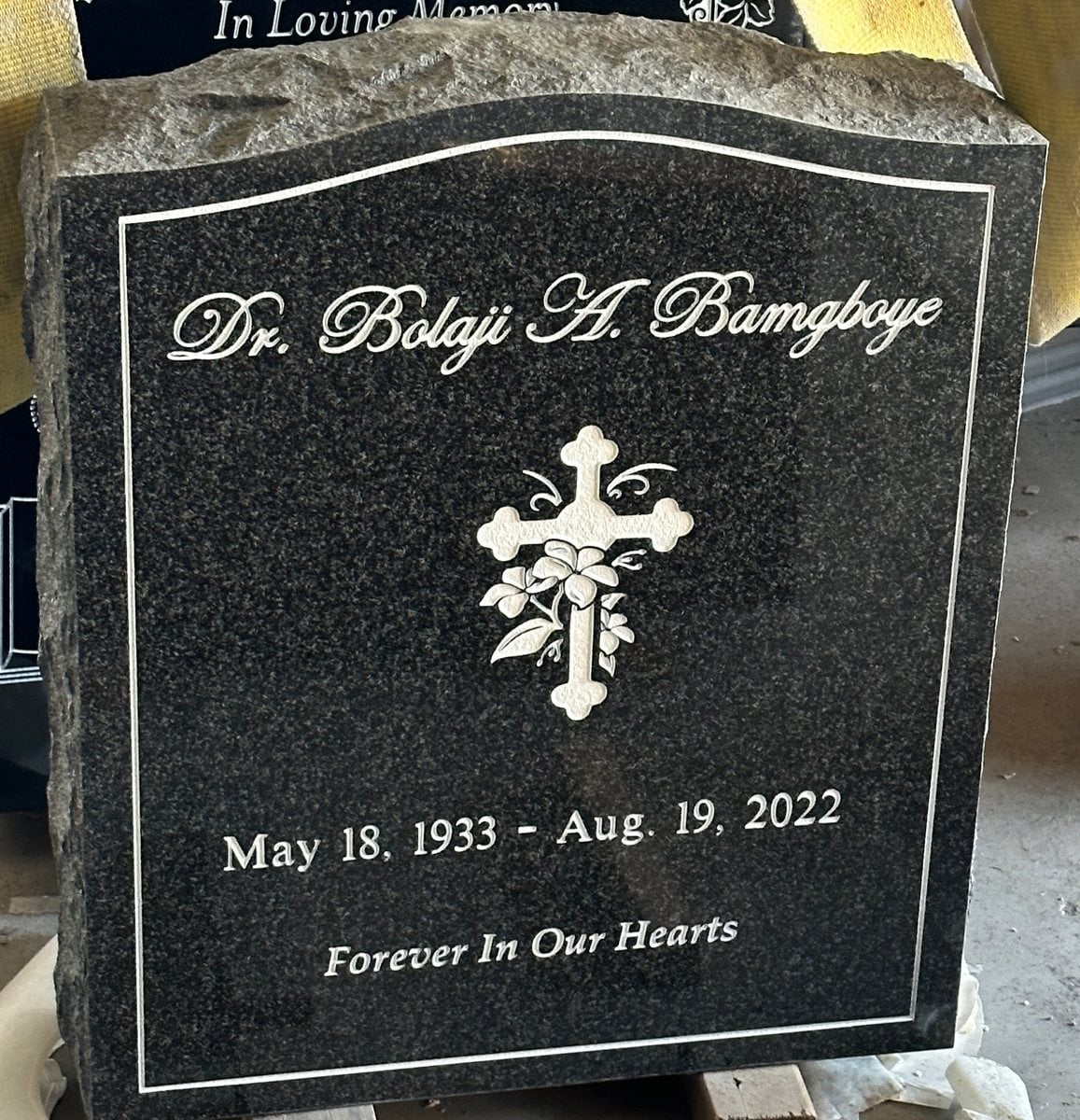 Oxford Gray granite upright monument with cross and lilies, Bamgboye family, Oak Park Cemetery