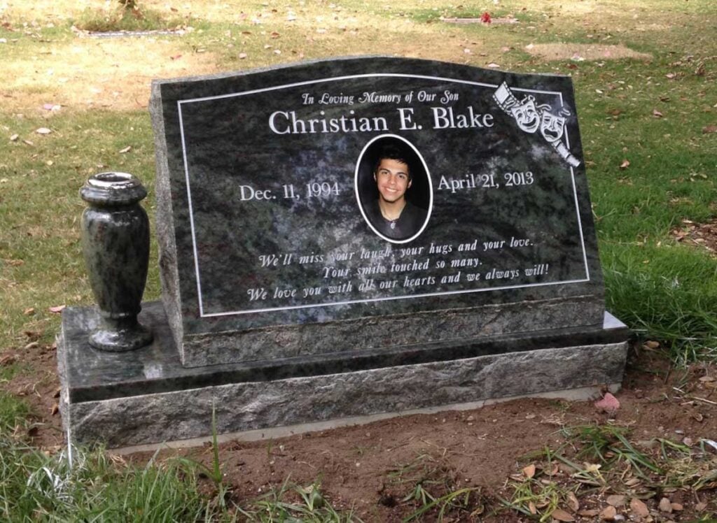 Tropical Green granite slant memorial with drama masks portrait, Blake family, Oak Park Cemetery