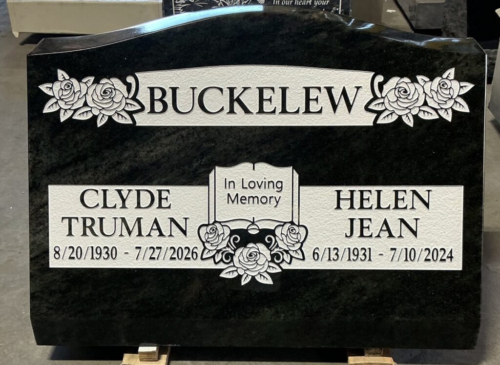 Black granite companion slant memorial with roses and open book, Buckelew family, Oak Park Cemetery