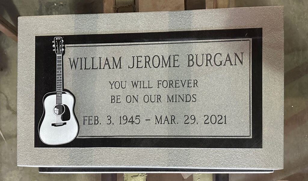 Black granite headstone with acoustic guitar, Burgan family, Oakdale Memorial Park