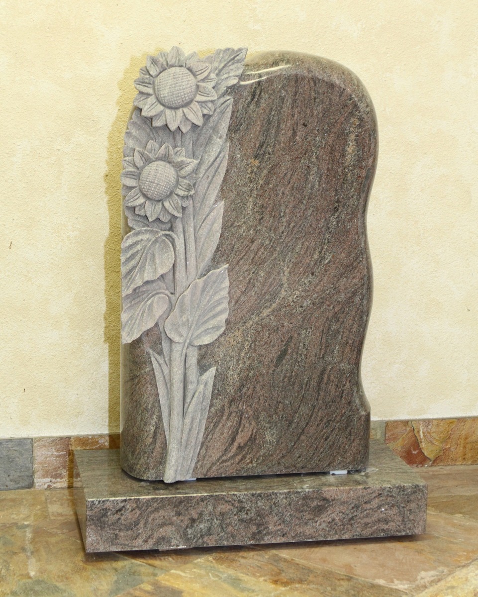 Paradiso granite upright monument with carved sunflowers