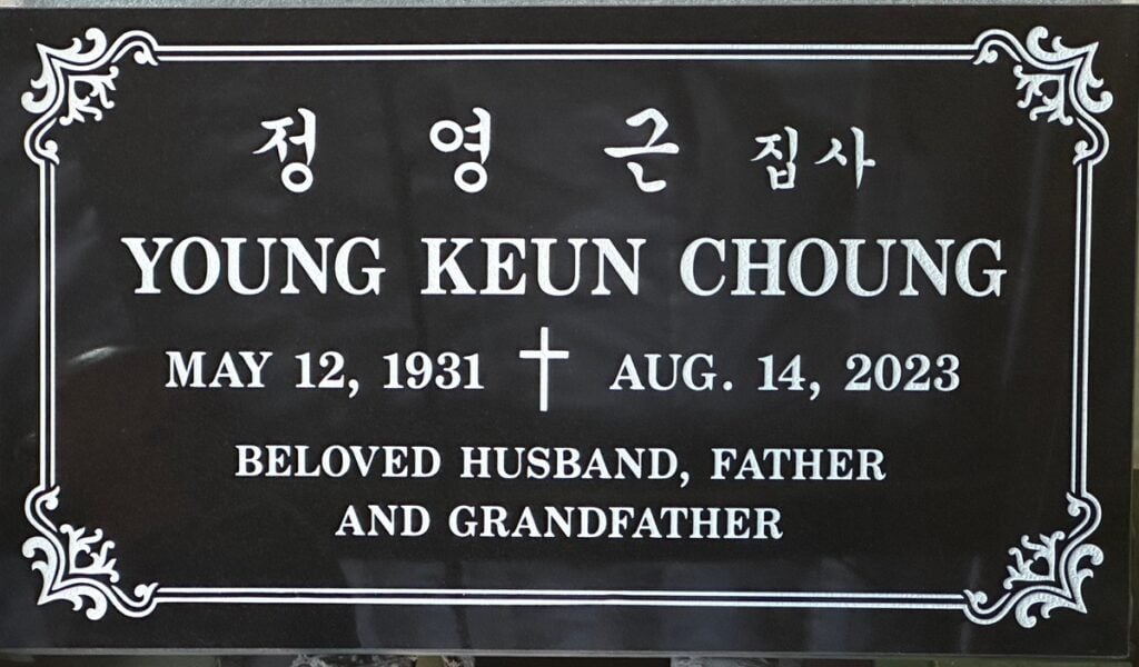 Black granite gravestone with korean script and cross, Choung family, Rose Hills Memorial Park
