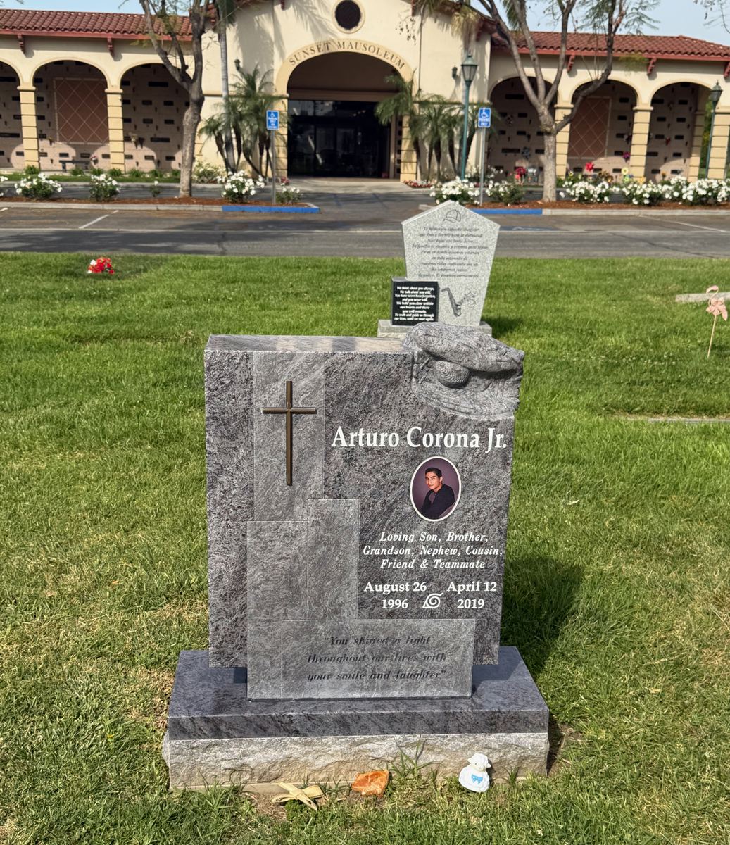 Bahama Blue granite upright monument with bronze cross and portrait, Corona family, Bellevue Memorial Park