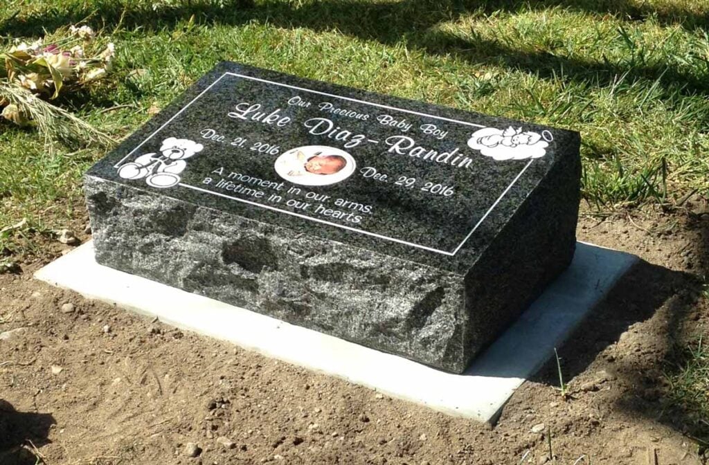 Tropical Green granite headstone with baby, Diaz-Randin family, Oak Park Cemetery