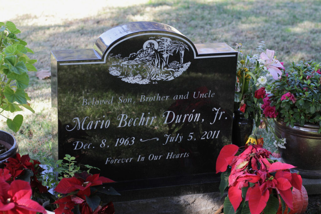 Black granite upright monument with jesus in gethsemane, Duron family, Oak Park Cemetery