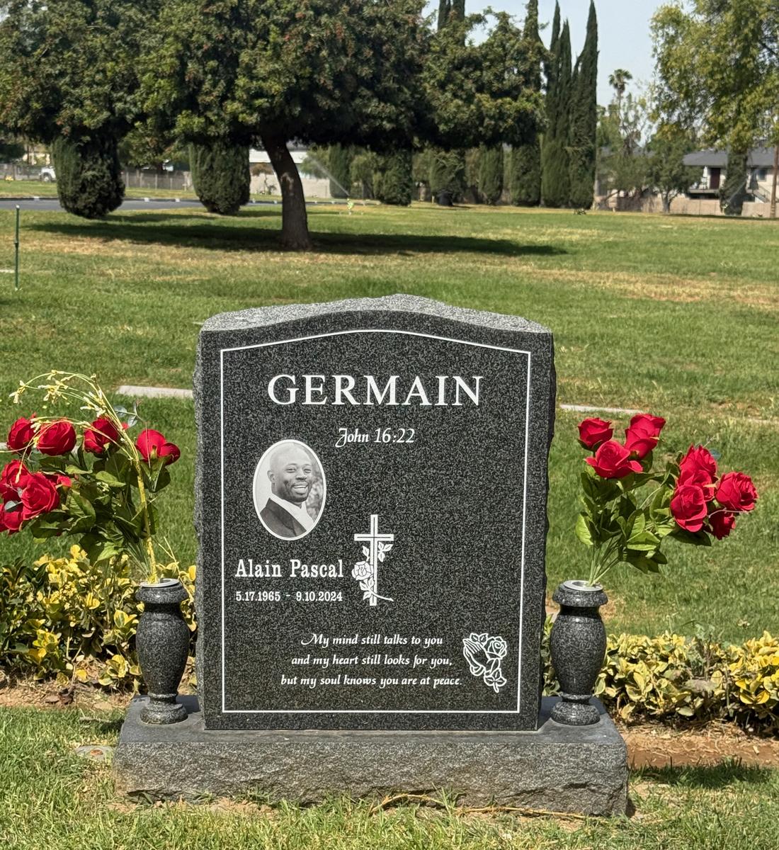 Oxford Gray granite upright monument with cross and praying hands, Germain family