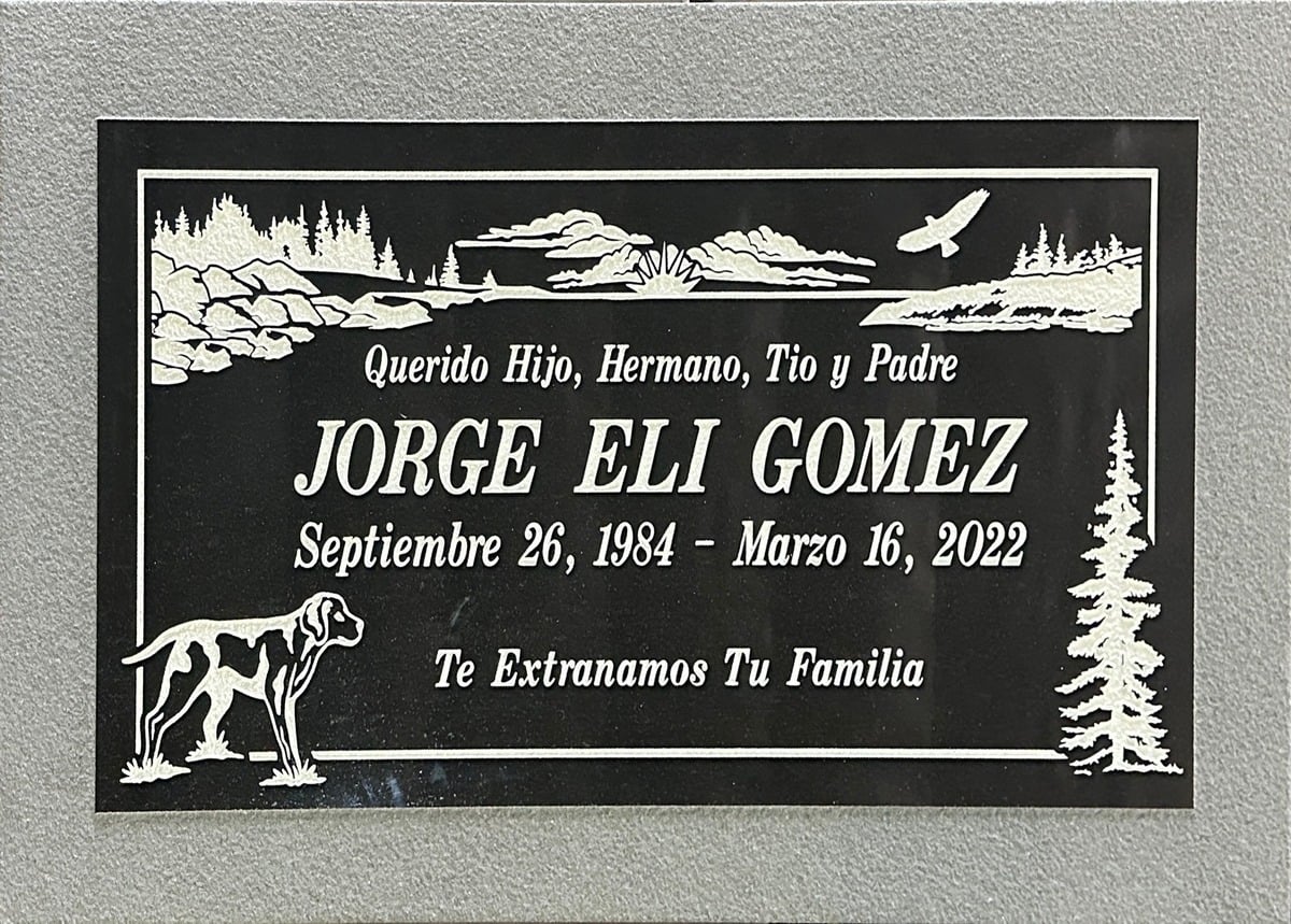 Black granite grave marker with mountain lake and dog, Gomez family, Pomona Valley Memorial Park