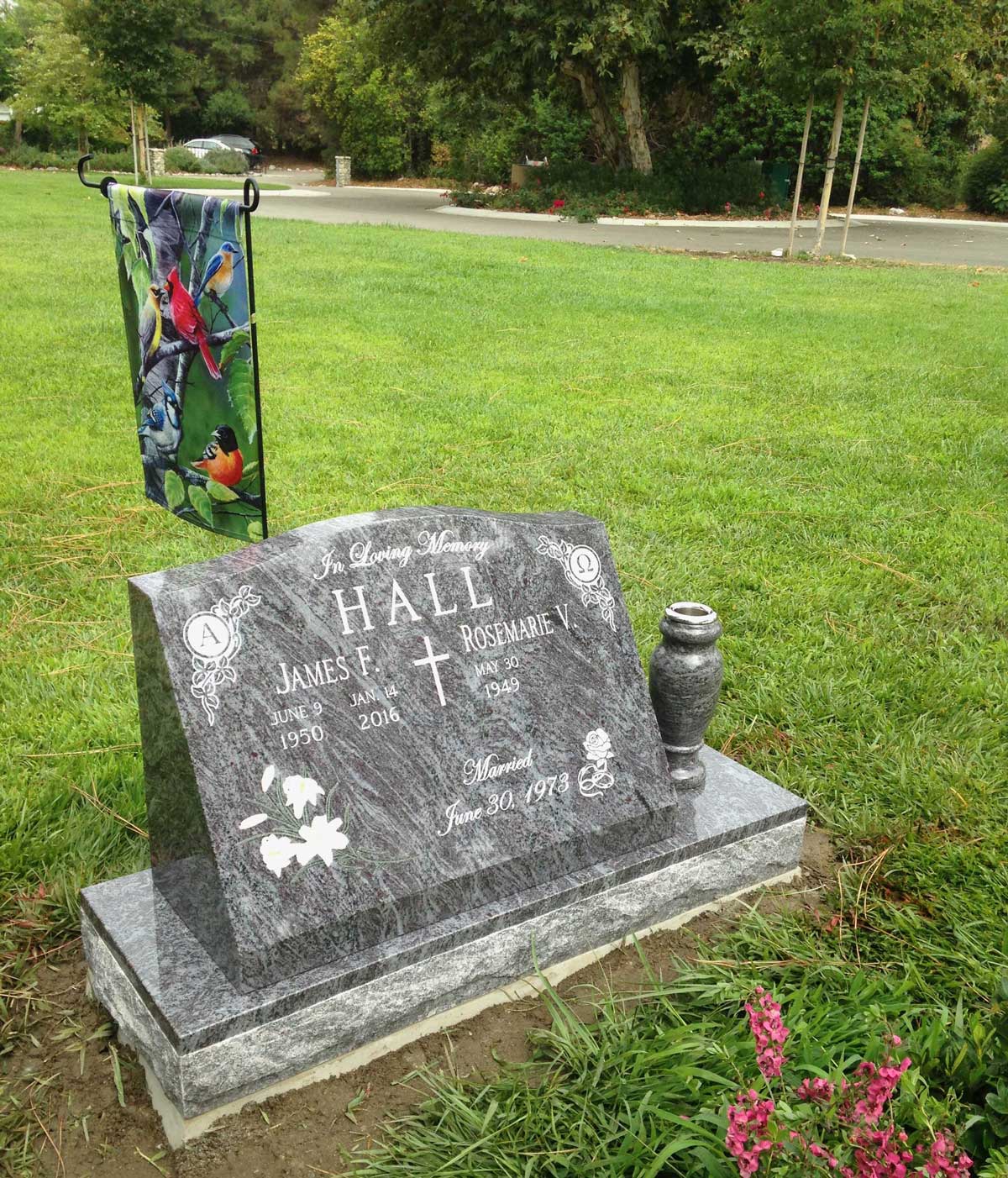 Bahama Blue granite companion slant memorial with cross and lilies, Hall family, Oak Park Cemetery