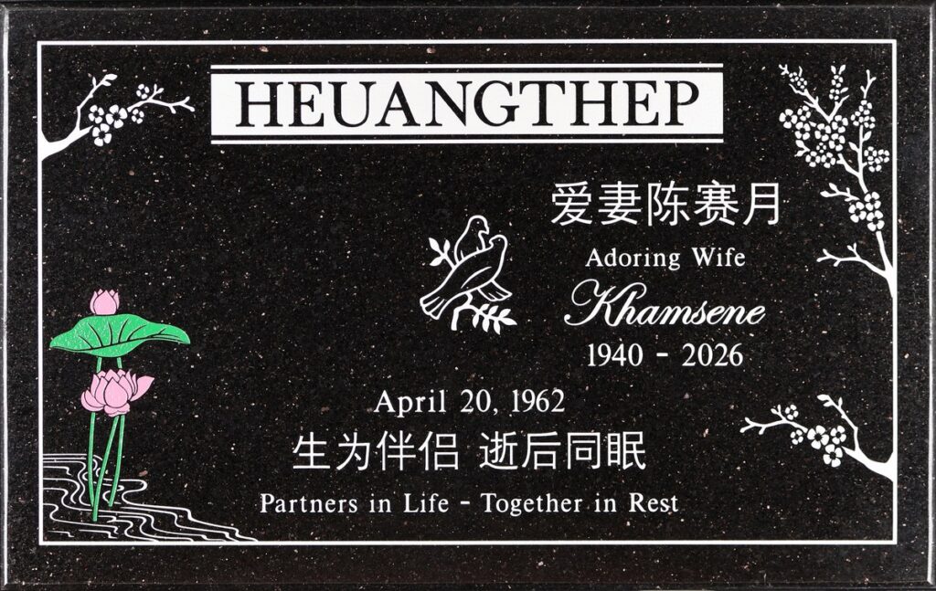 Galaxy Black granite headstone with lotus and cherry blossoms, Heuangthep family, Live Oak Memorial Park