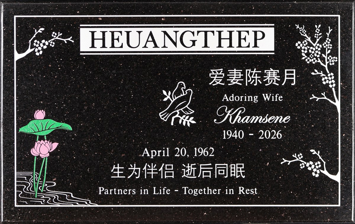 Galaxy Black granite headstone with lotus and cherry blossoms, Heuangthep family, Live Oak Memorial Park