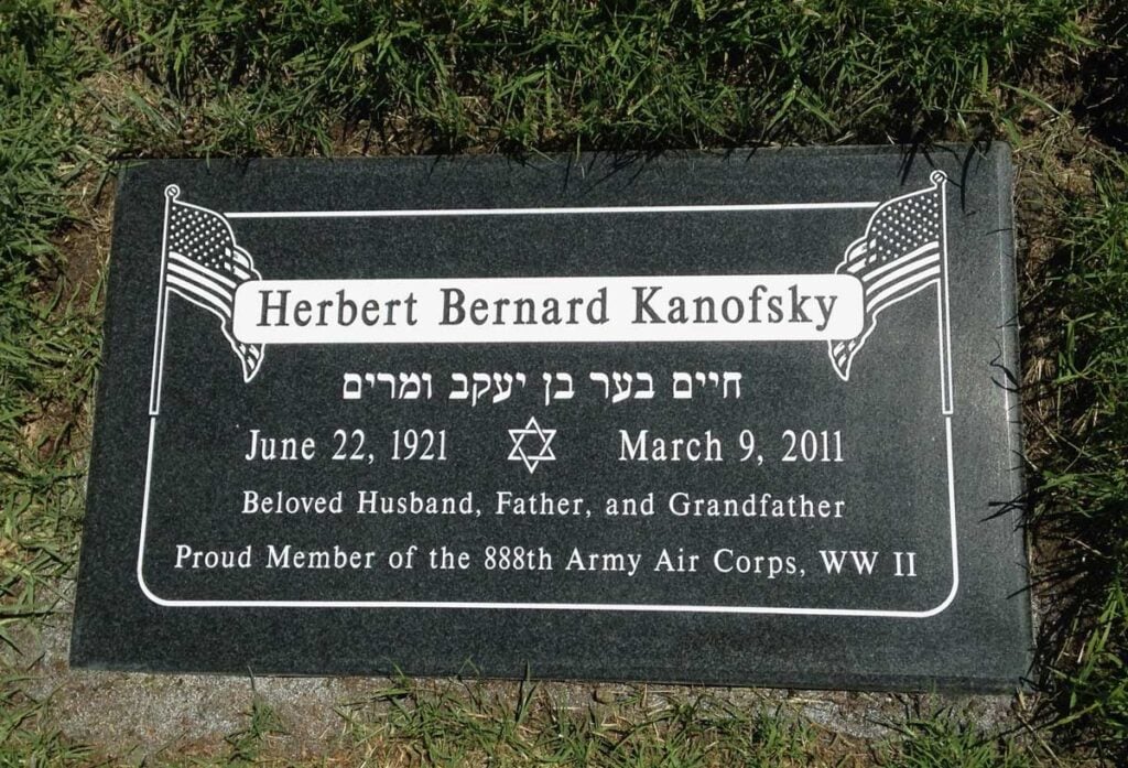 Black granite headstone with american flags, Kanofsky family, Pacific View Memorial Park